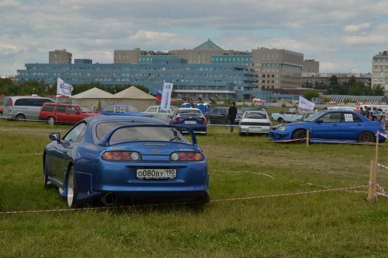 Blue sports car at outdoor event