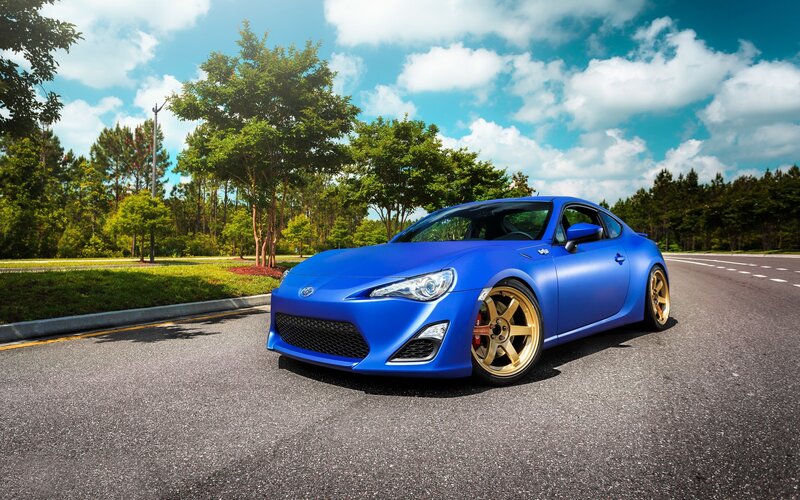 Blue Sports Car — Bright, Sunny