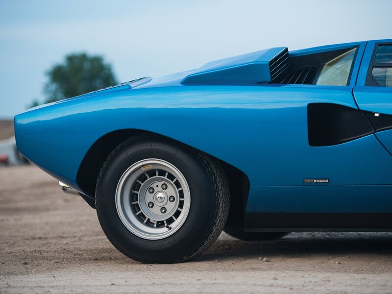 Blue Sports Car — Calm, Afternoon, Photograph, Car Wheel