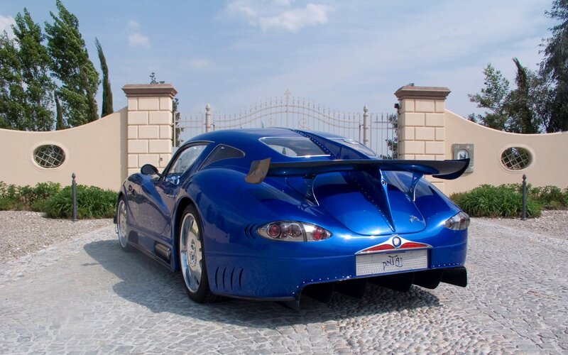Blue Sports Car — Calm, Afternoon, Photograph, Gate, Trees