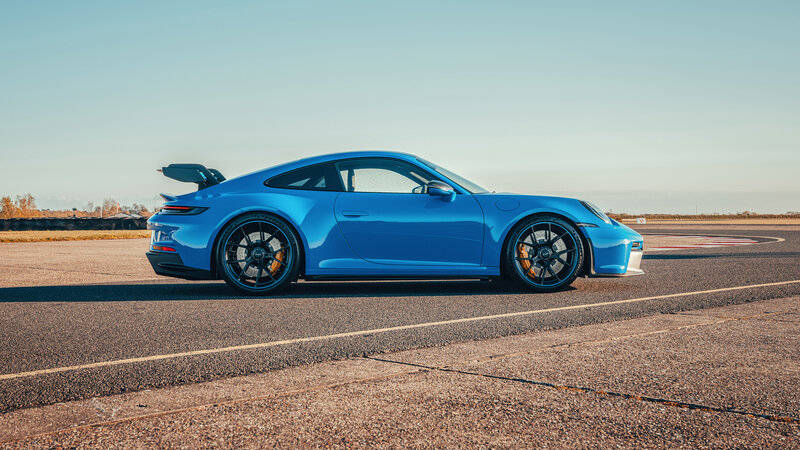 Blue Sports Car — Calm, Afternoon, Photograph, Race Track, Tarmac