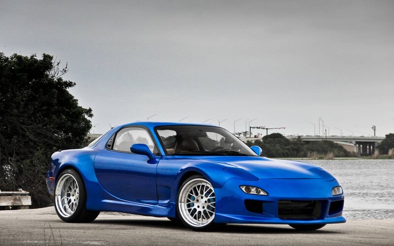 Blue Sports Car — Calm, Afternoon, Photograph, Trees, Bridge