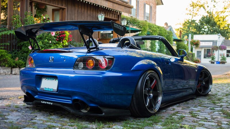 Blue Sports Car — Calm, Afternoon, Photograph, Wings