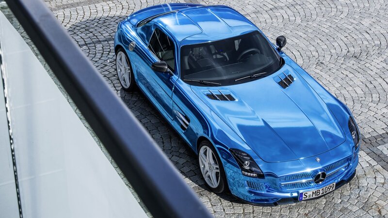 Blue Sports Car — Dramatic, Afternoon, Photograph, Cobblestone, Railing