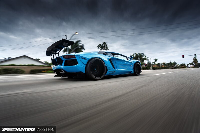 Blue Sports Car — Dramatic, Afternoon, Photograph, Road, Palm Trees