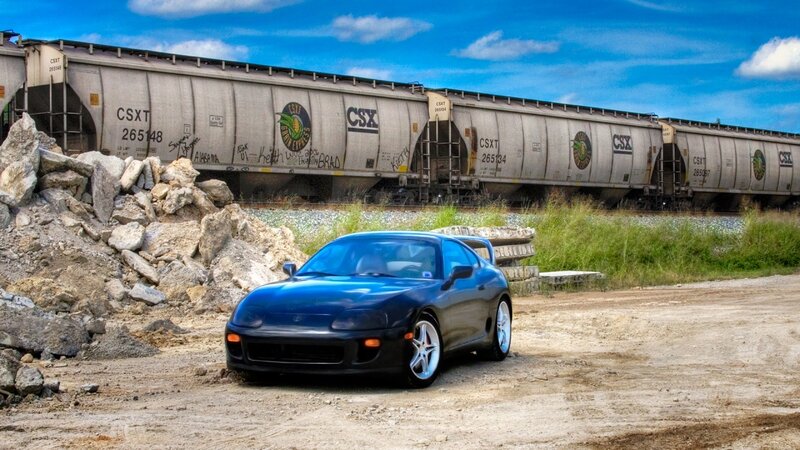 Blue Sports Car — Dramatic, Afternoon, Photograph, Train