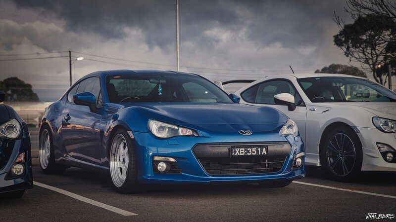 Blue Sports Car — Dramatic, Afternoon, Photograph, White Car