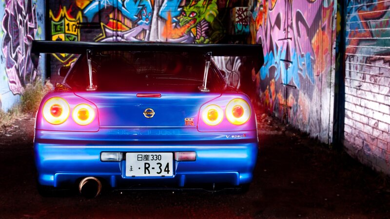 Blue Sports Car — Dramatic, Night, Photograph, Graffiti Wall