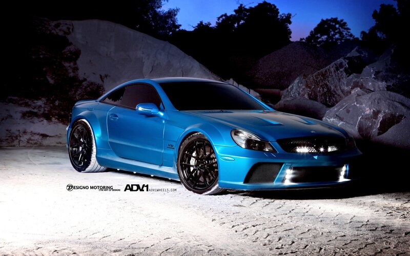 Blue Sports Car — Dramatic, Night, Photograph, Rocks
