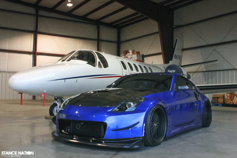 Blue Sports Car — Dramatic, Photograph, Airplane