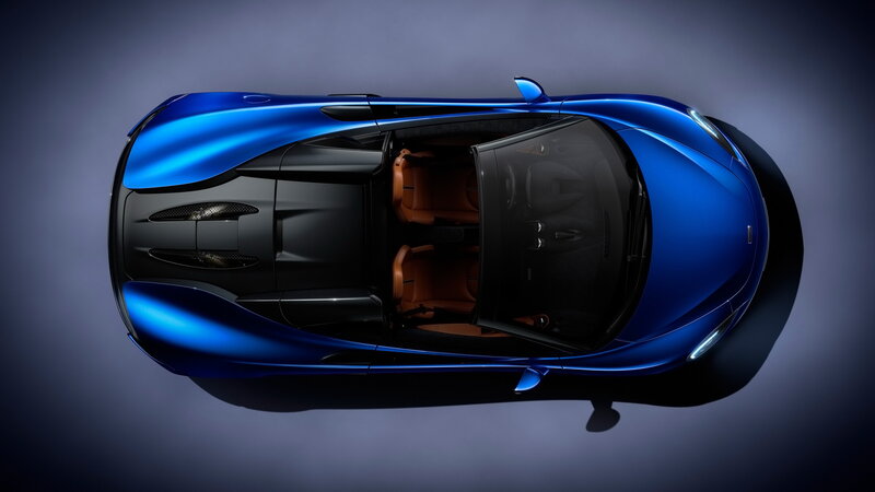 Blue Sports Car — Dramatic, Photograph, Car Interior, Brown Seats