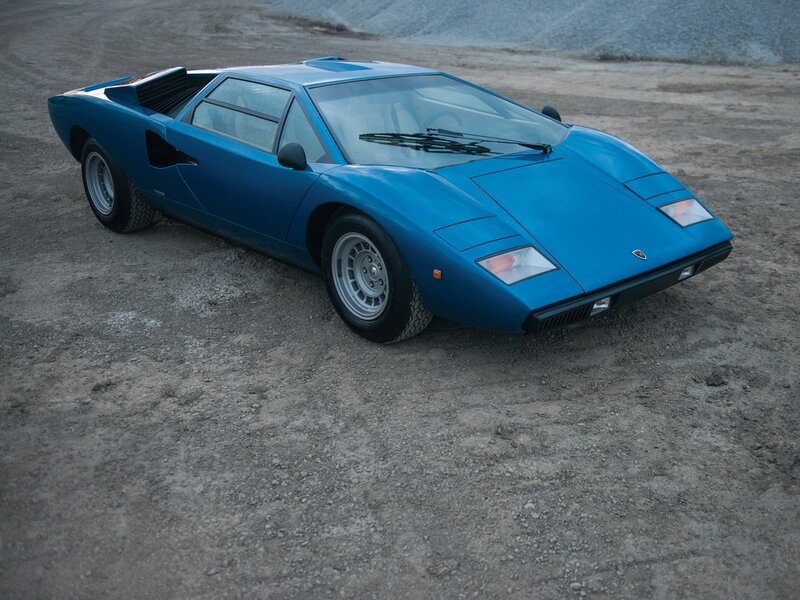 Blue Sports Car — Dramatic, Photograph, Dirt Ground