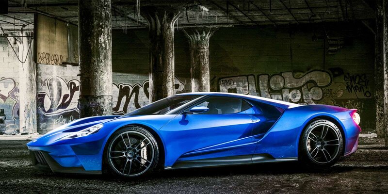 Blue Sports Car — Dramatic, Photograph, Graffiti