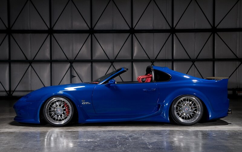 Blue Sports Car — Dramatic, Photograph, Red Seats