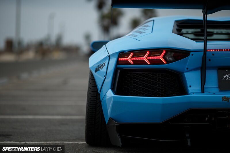 Blue Sports Car — Dramatic, Photograph, Taillights