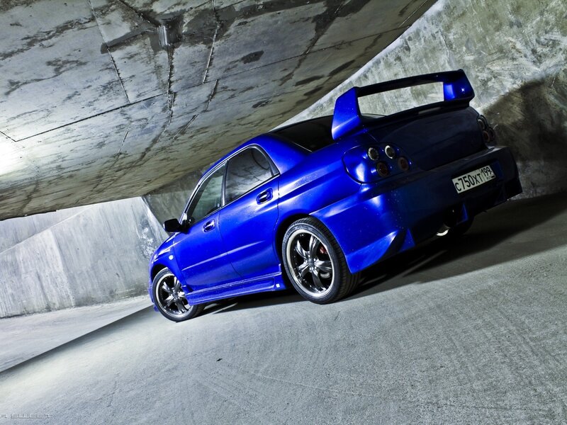Blue Sports Car — Dramatic, Photograph, Tunnel, Rear Wing, Black Wheels