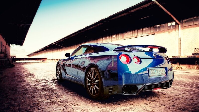Blue Sports Car — Dramatic, Sunset, Photograph, Building, Cobblestone