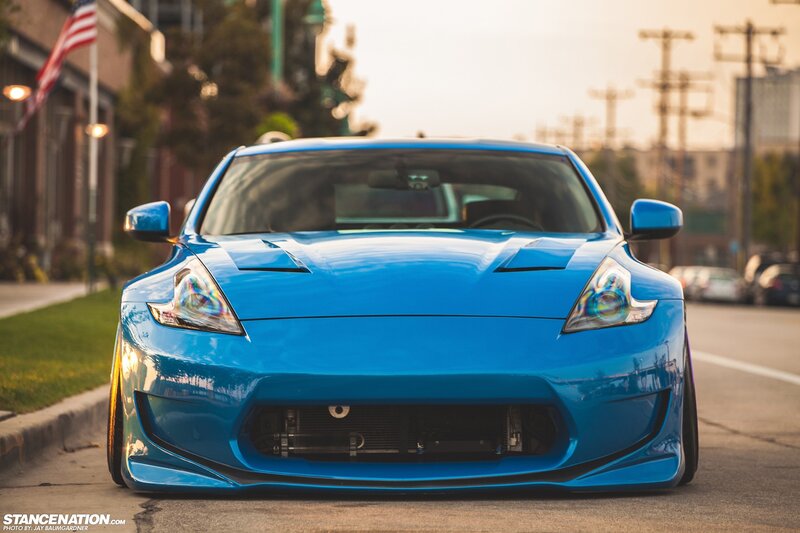 Blue Sports Car — Dramatic, Sunset, Photograph, Flag