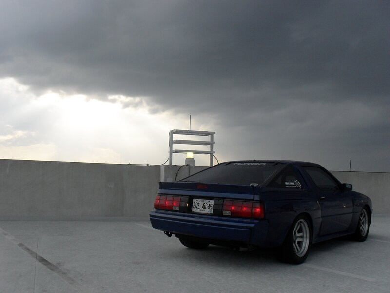 Blue Sports Car — Dramatic, Sunset, Photograph, Sky