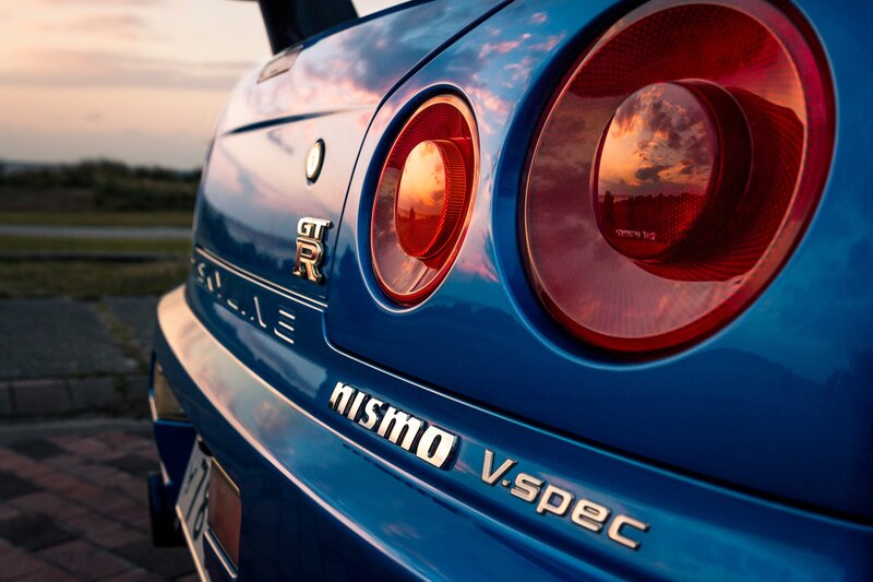 Blue Sports Car — Dramatic, Sunset, Photograph, Taillight