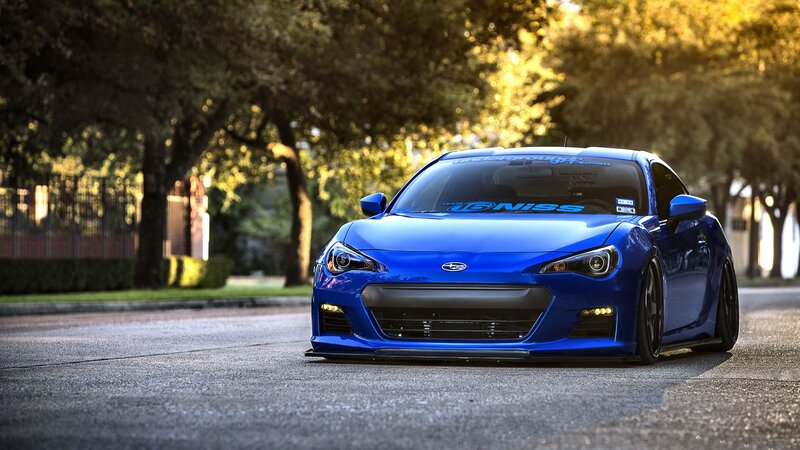 Blue Sports Car — Dramatic, Sunset, Photograph, Trees, Road