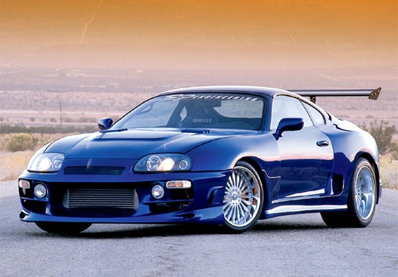 Blue Sports Car — Dramatic, Sunset, Photograph, Wings