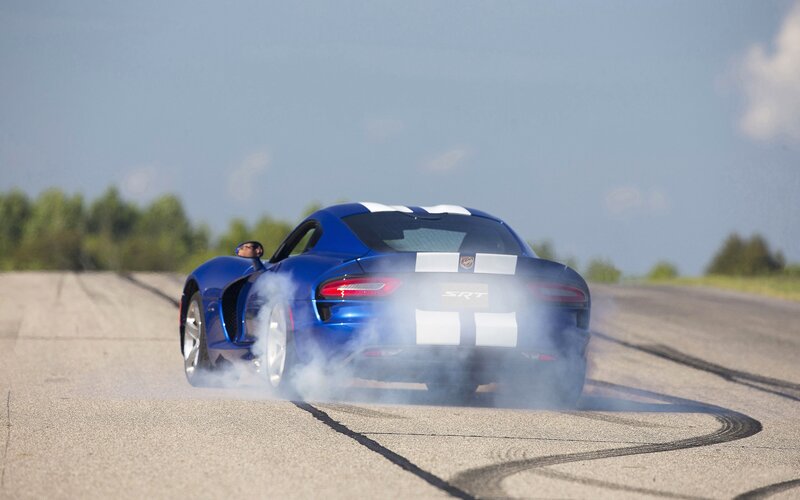 Blue Sports Car Drifting — Dynamic, Afternoon