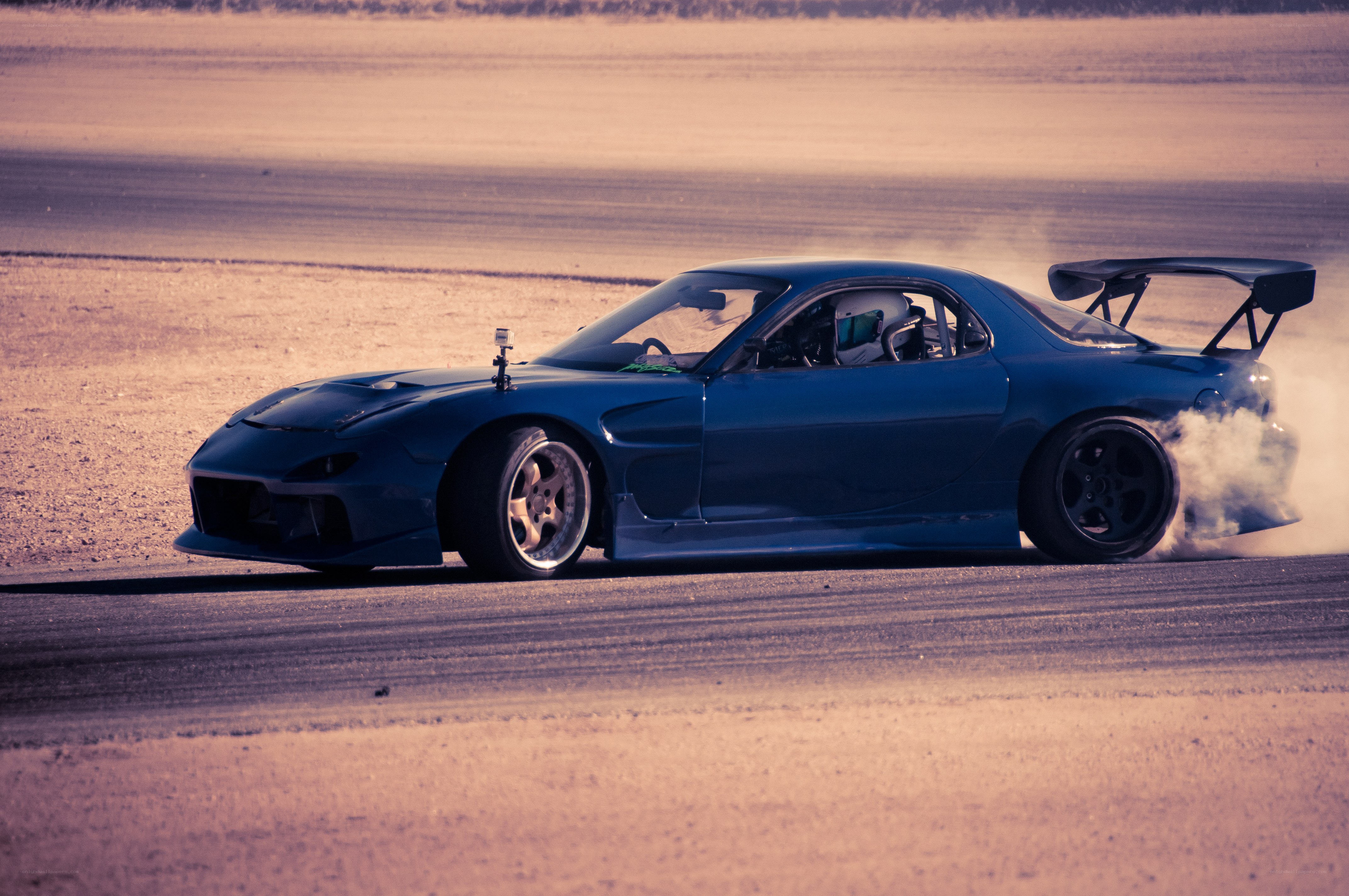 Blue sports car drifting