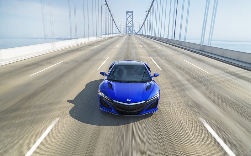 Blue Sports Car — Dynamic, Afternoon, Photograph, Bridge, Ocean