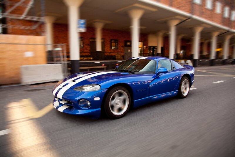 Blue Sports Car — Dynamic, Afternoon, Photograph, Building, Street