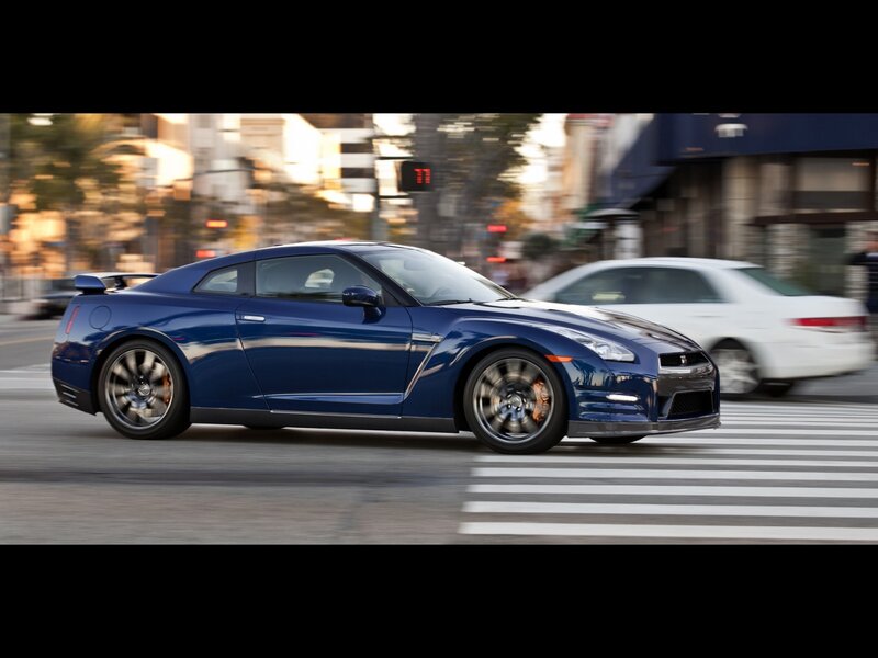 Blue Sports Car — Dynamic, Afternoon, Photograph, Crosswalk