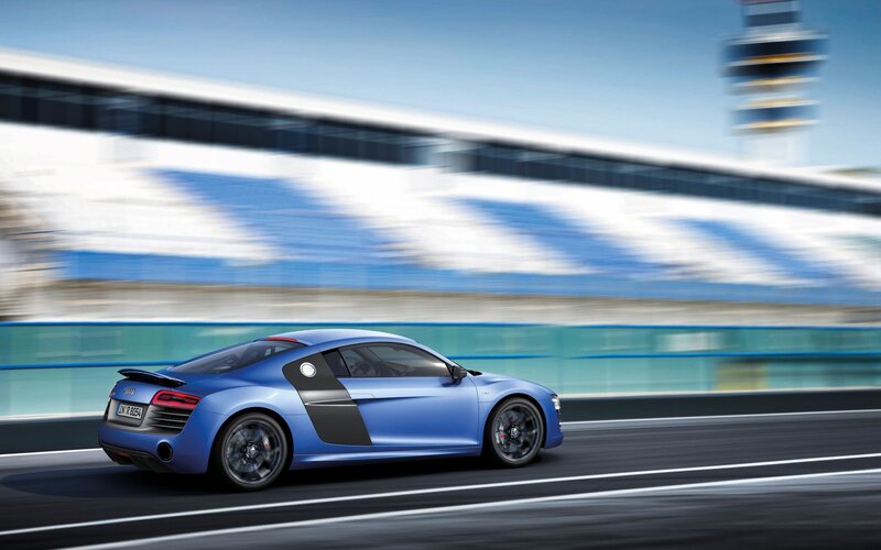 Blue Sports Car — Dynamic, Afternoon, Photograph, Race Track, Building, Tower