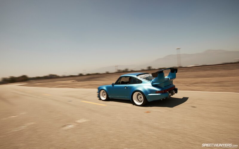 Blue Sports Car — Dynamic, Afternoon, Photograph, Race Track, Mountains