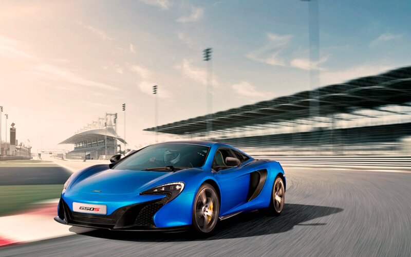 Blue Sports Car — Dynamic, Afternoon, Photograph, Racetrack