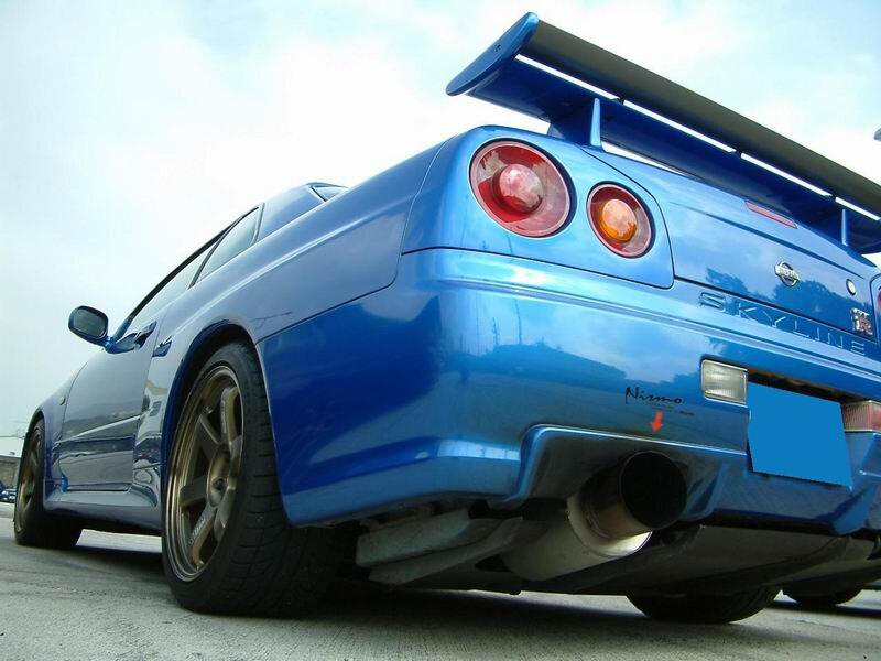 Blue Sports Car — Dynamic, Afternoon, Photograph, Rear Wing