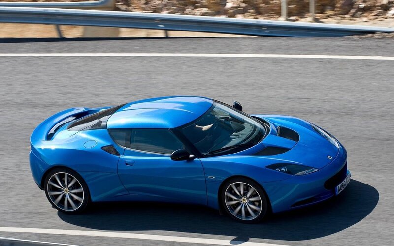 Blue Sports Car — Dynamic, Afternoon, Photograph, Road, Guardrail