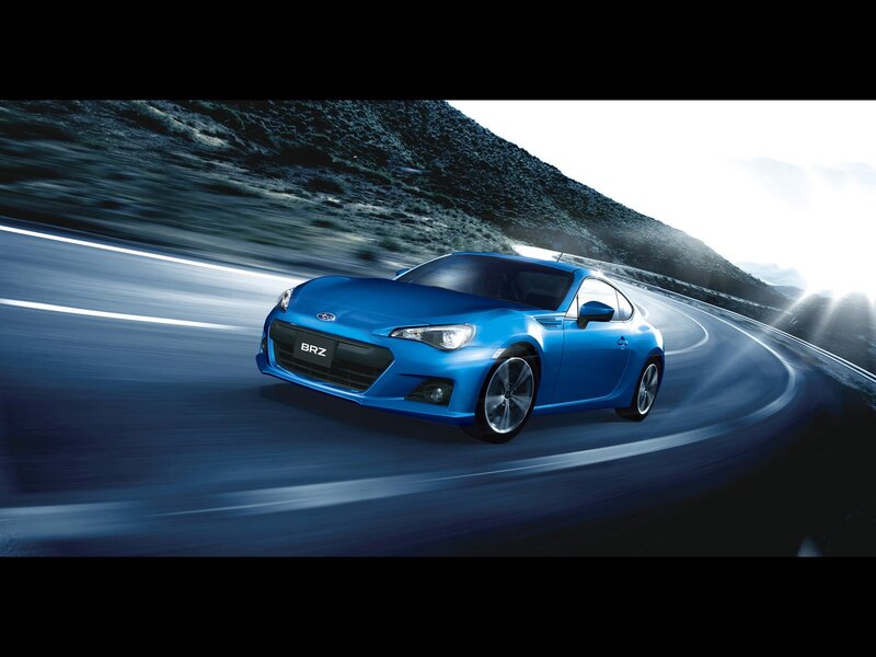 Blue Sports Car — Dynamic, Afternoon, Photograph, Road, Mountain, Sunlight
