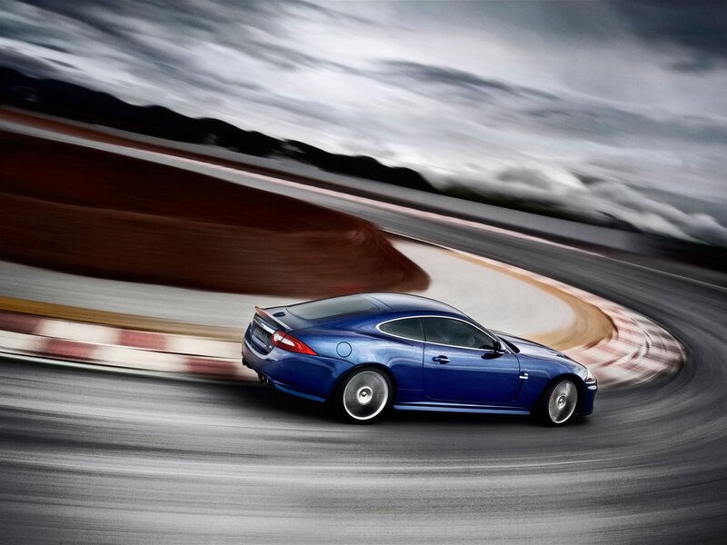 Blue Sports Car — Dynamic, Photograph, Race Track, Motion Blur