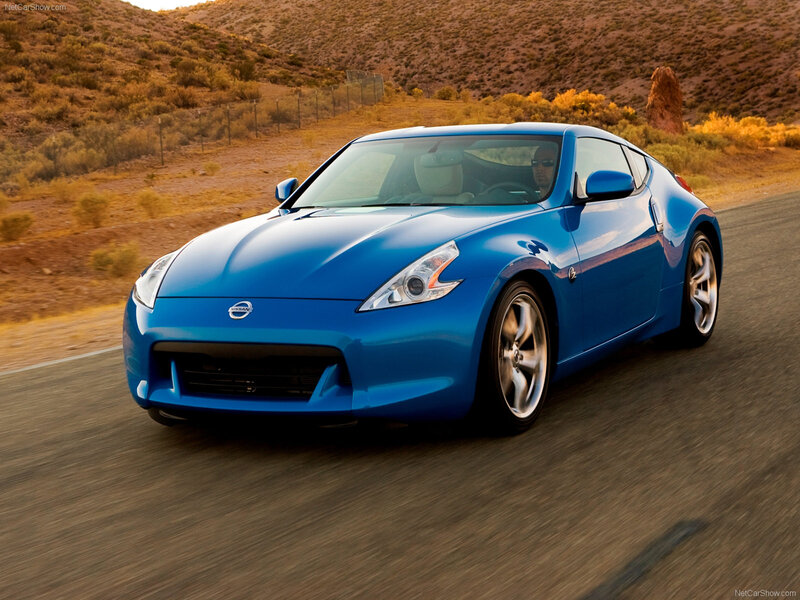 Blue Sports Car — Dynamic, Sunset, Photograph, Driver, Desert Landscape