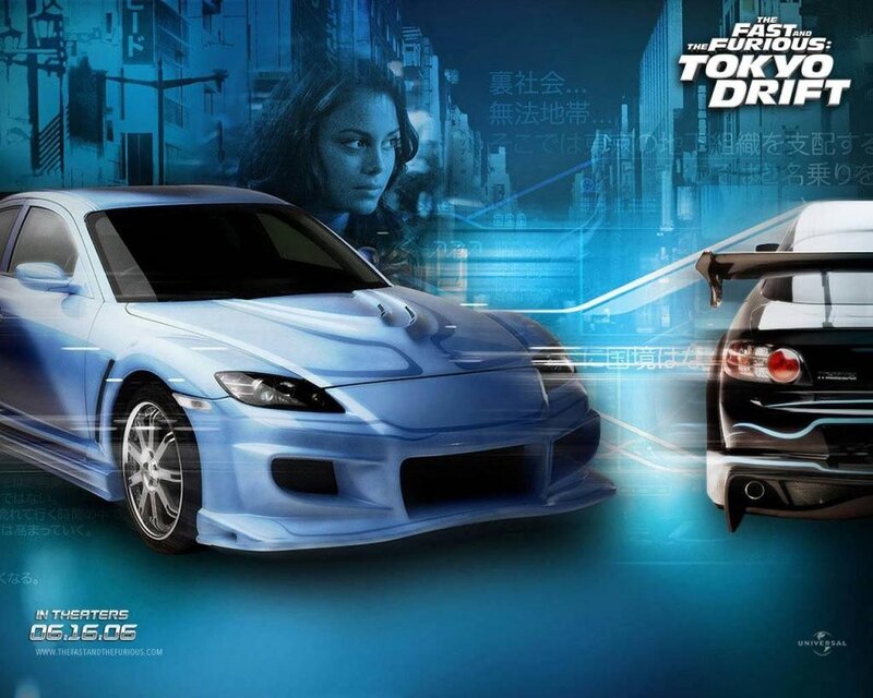 Blue Sports Car in City — Dramatic