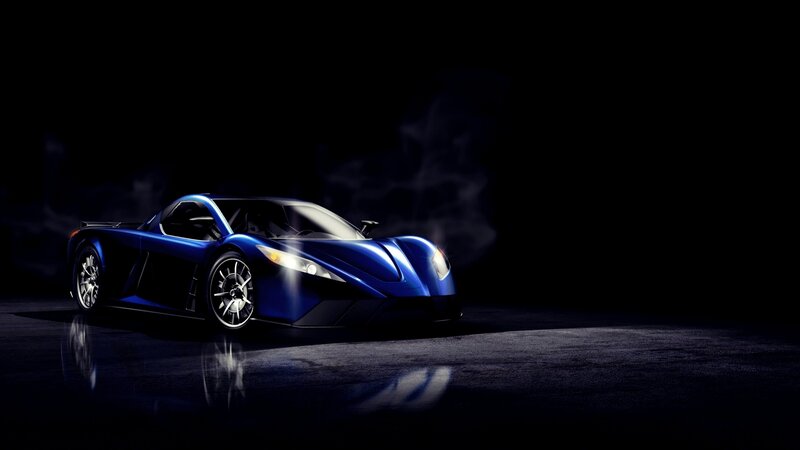 blue sports car in dark setting