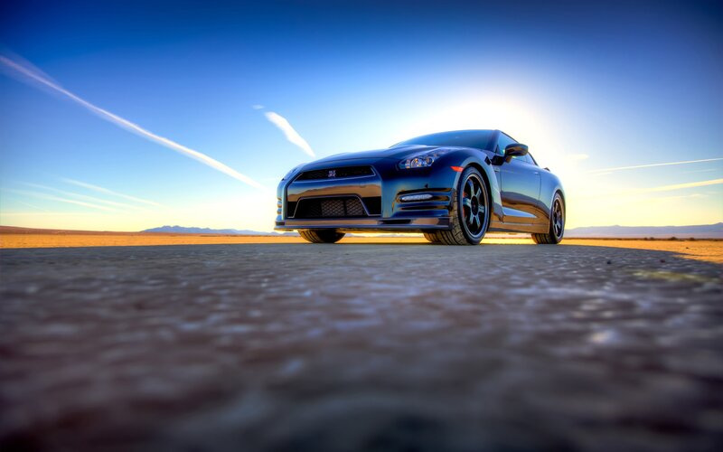 Blue sports car in desert