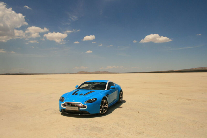 Blue sports car in desert