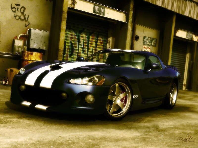Blue sports car in garage