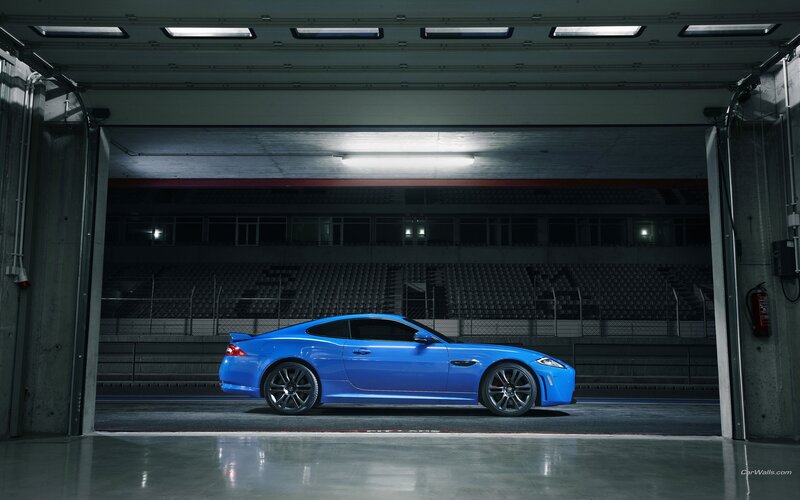 Blue sports car in garage