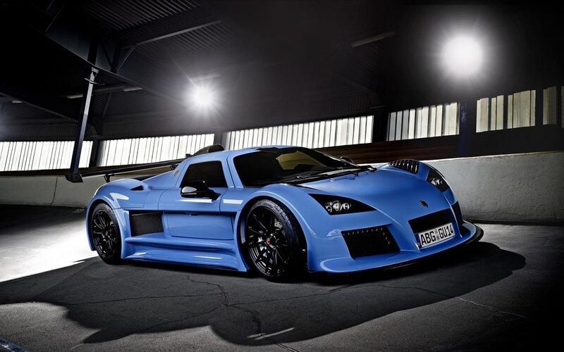 Blue sports car in garage