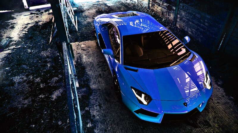 blue sports car in garage