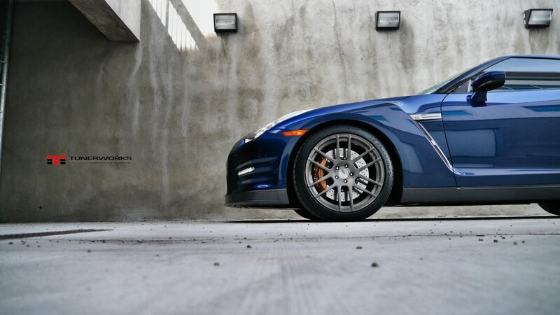 blue sports car in garage