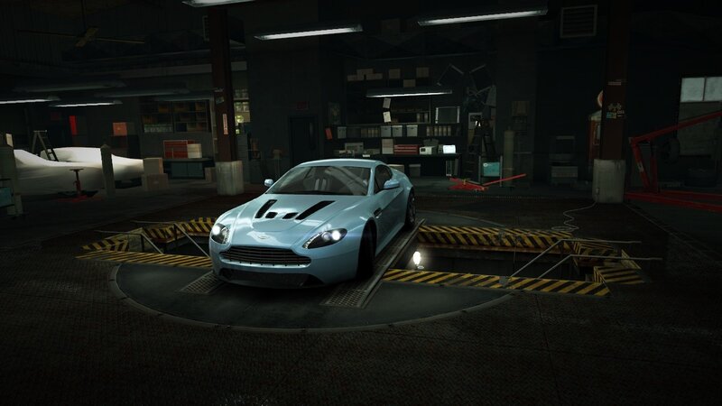 blue sports car in garage