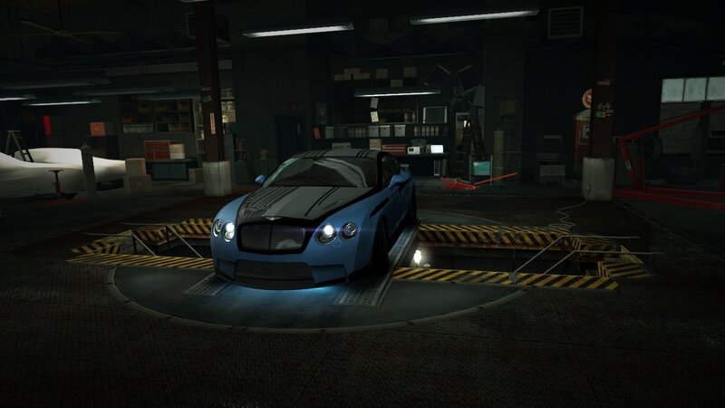blue sports car in garage